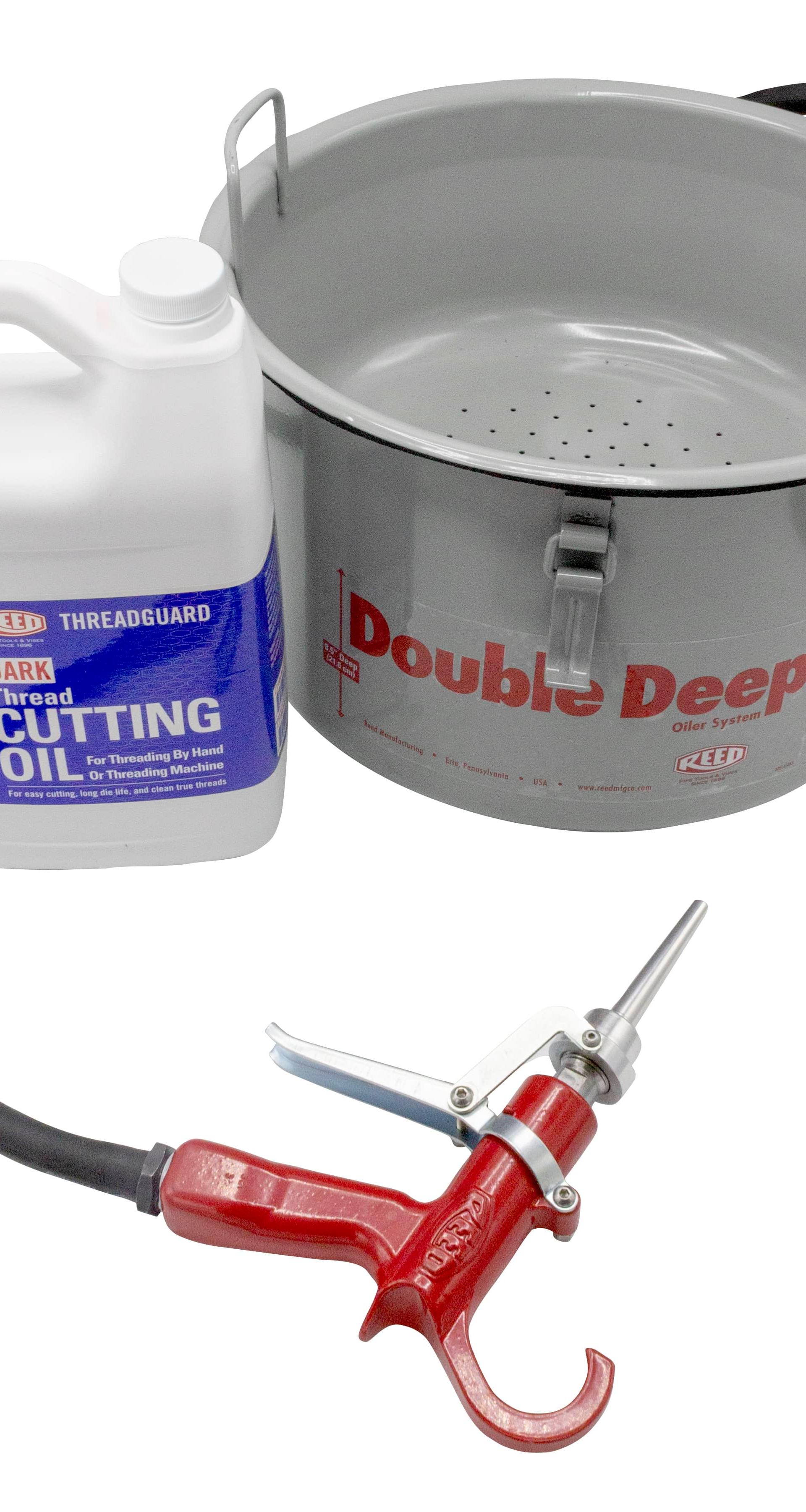 Oiler with oil gun, gallon of cutting oil, drip pan and metal bucket
